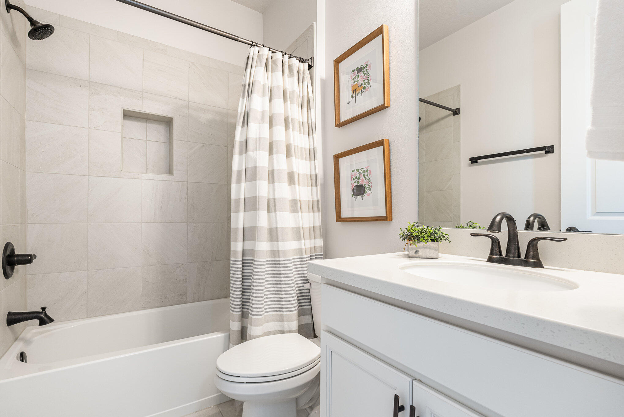 3179 Ribbon Grass Drive Melbourne, FL 32940 - Photo 30 of 52 a bathroom with a sink a toilet and shower