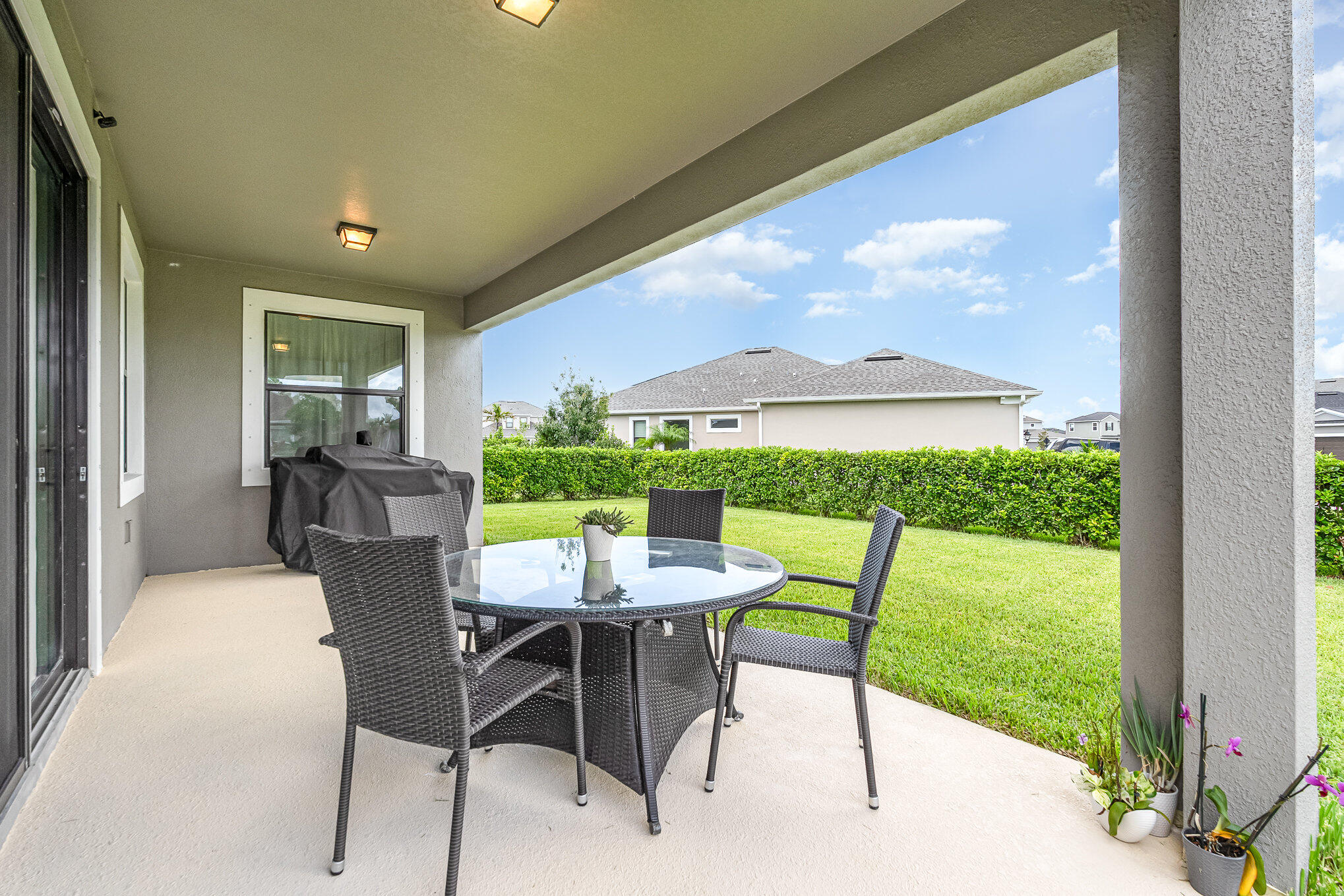 3179 Ribbon Grass Drive Melbourne, FL 32940 - Photo 34 of 52 a view of a dining room with furniture window and outside view