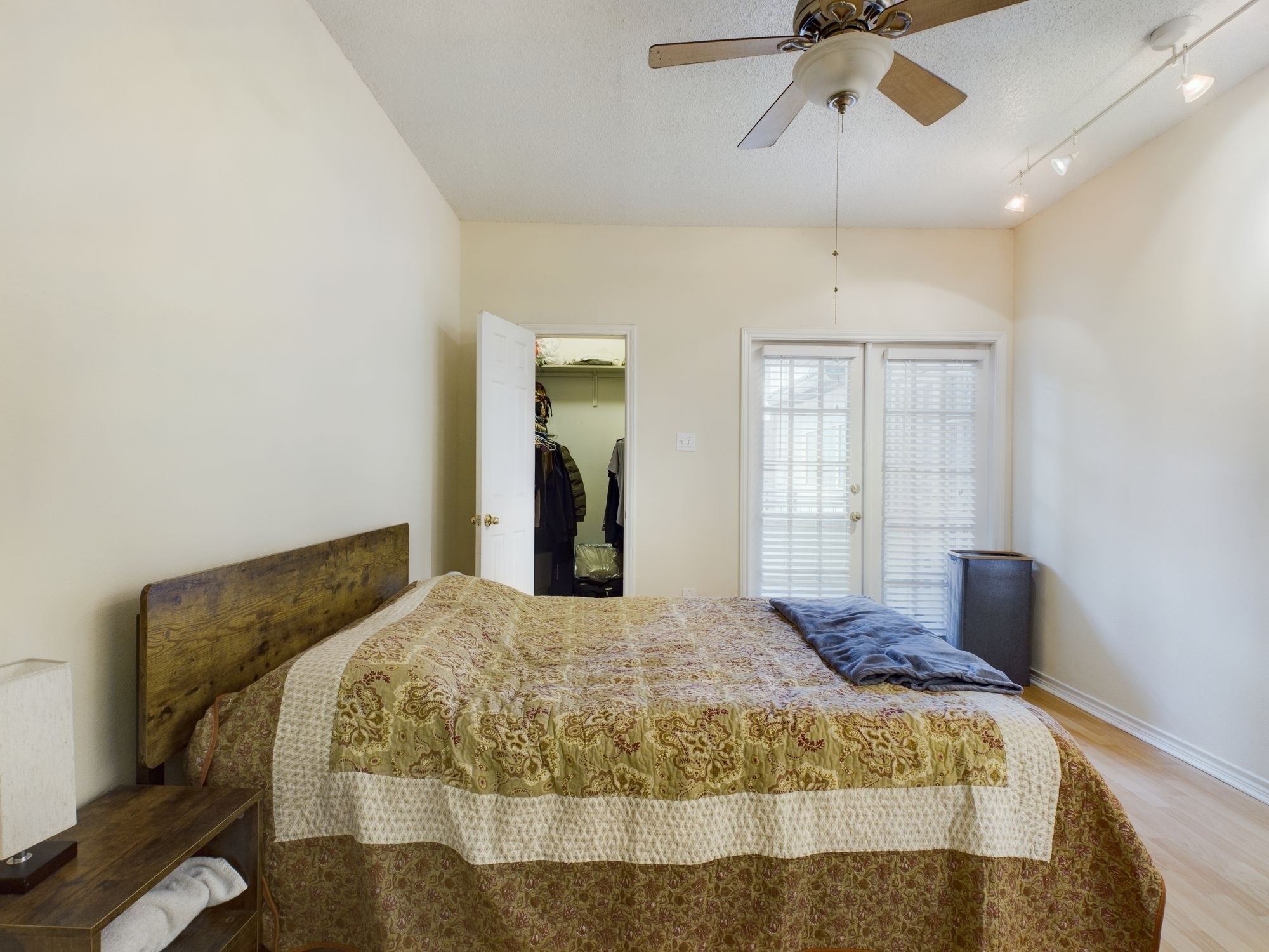 3001 Cedar Street, Unit 209 Austin, TX 78705 - Photo 7 of 17 a bedroom with a bed and window