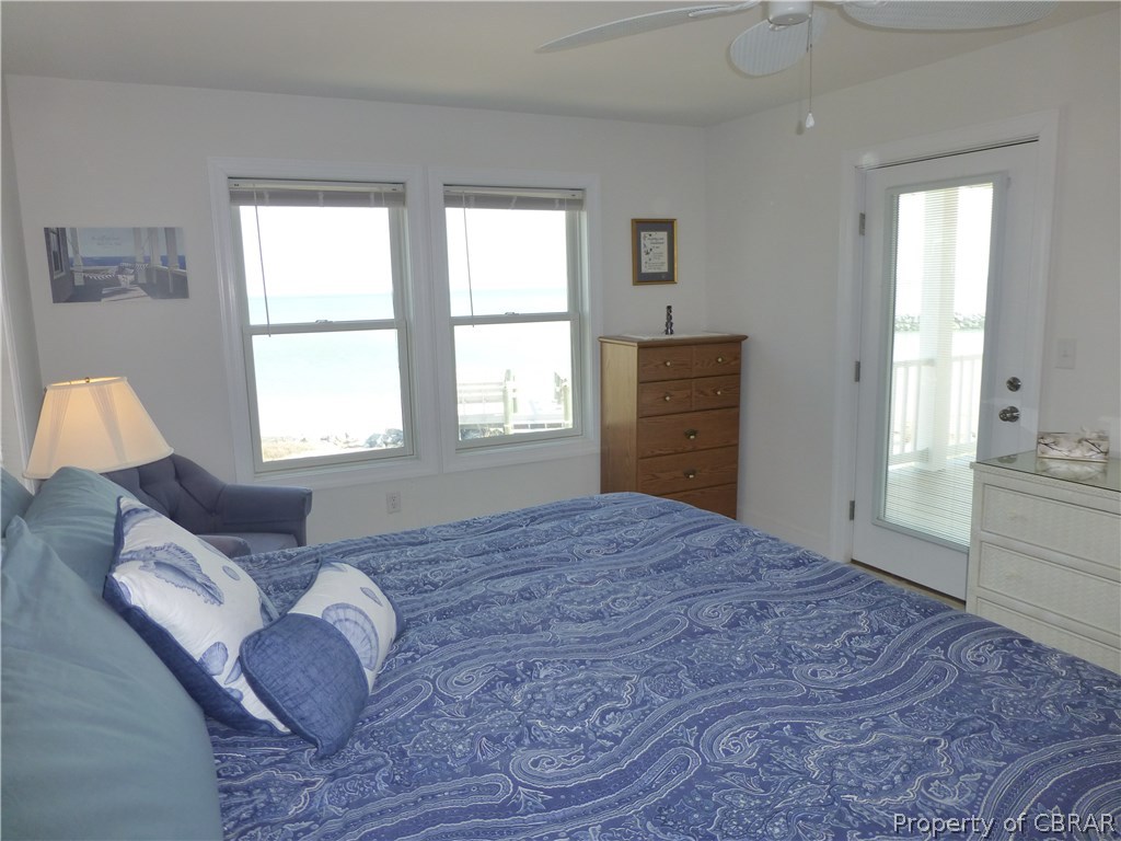 8 Chesapeake Shore Road Port Haywood, VA 23138 - Photo 10 of 26 Sunny Master Bedroom opens up onto private covered deck. Wake to the sound of the waves...