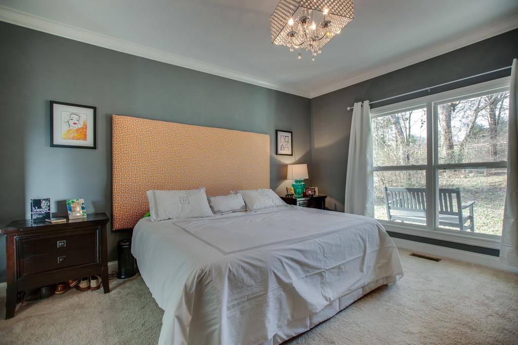 4065 Clovercroft Road Franklin, TN 37067 - Photo 18 of 30 a bedroom with a bed and a window
