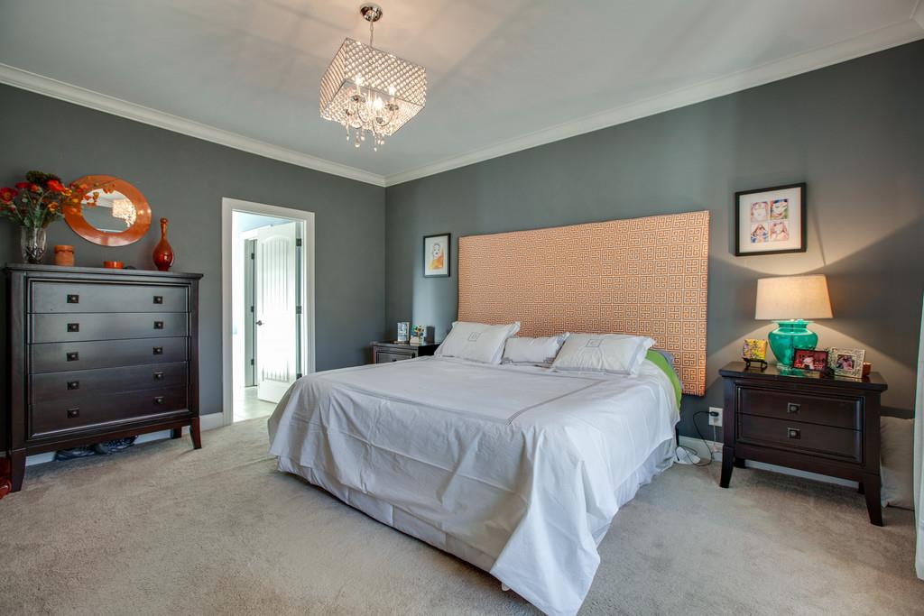 4065 Clovercroft Road Franklin, TN 37067 - Photo 19 of 30 a bedroom with a bed and a dresser