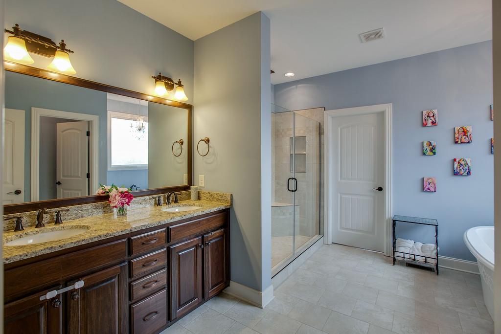 4065 Clovercroft Road Franklin, TN 37067 - Photo 21 of 30 a spacious bathroom with a double vanity sink mirror and double