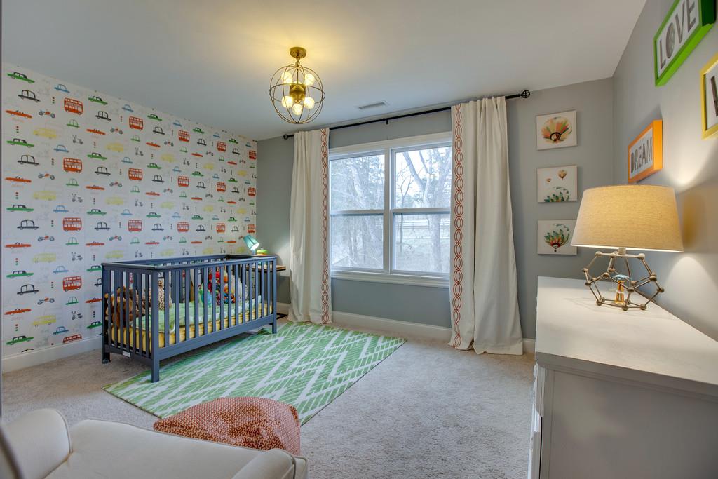 4065 Clovercroft Road Franklin, TN 37067 - Photo 22 of 30 a bedroom with furniture and a window