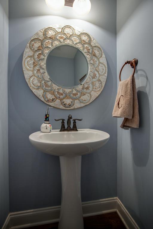 4065 Clovercroft Road Franklin, TN 37067 - Photo 28 of 30 a view of a bathroom with a sink and mirror