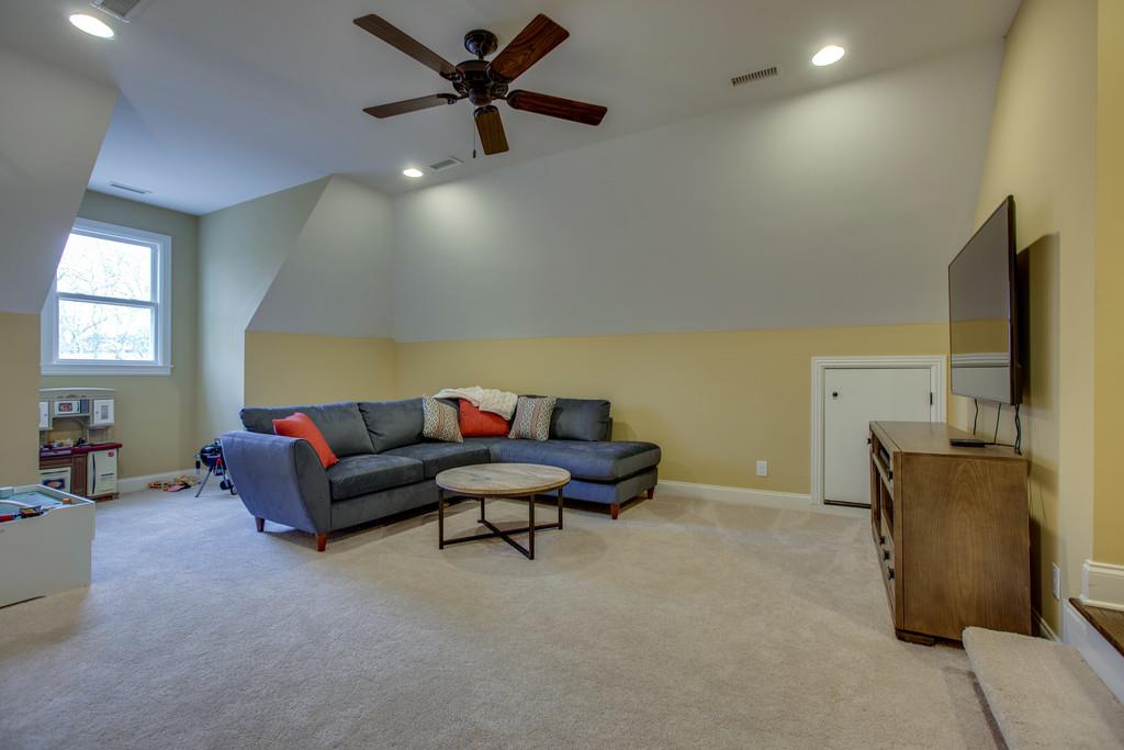 4065 Clovercroft Road Franklin, TN 37067 - Photo 29 of 30 a living room with furniture and a flat screen tv