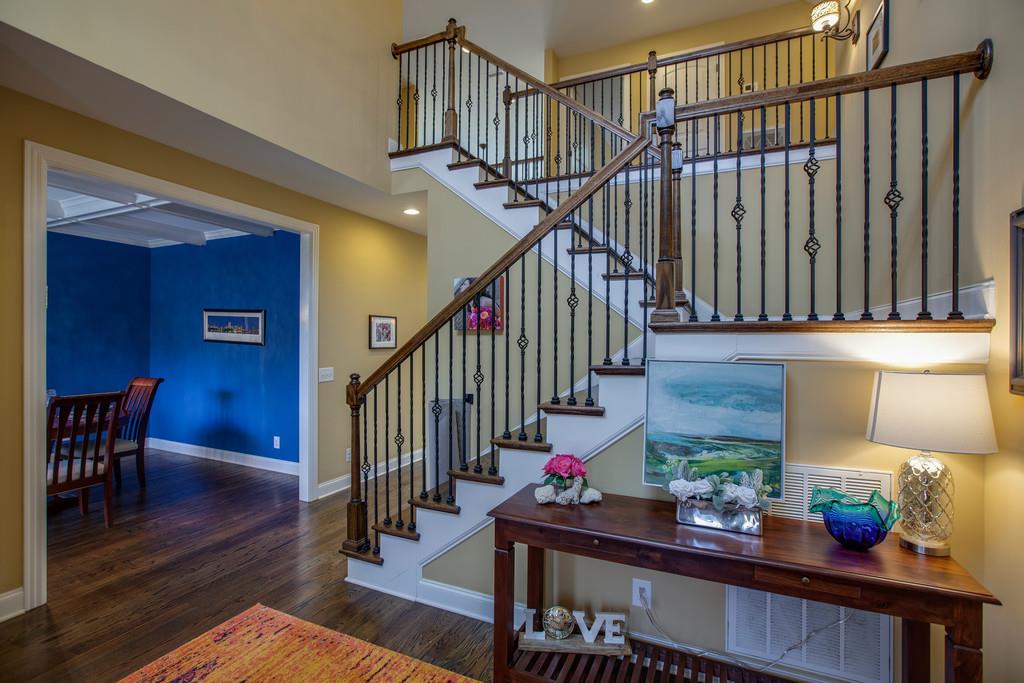 4065 Clovercroft Road Franklin, TN 37067 - Photo 5 of 30 a view of entryway dining room and hall with wooden floor