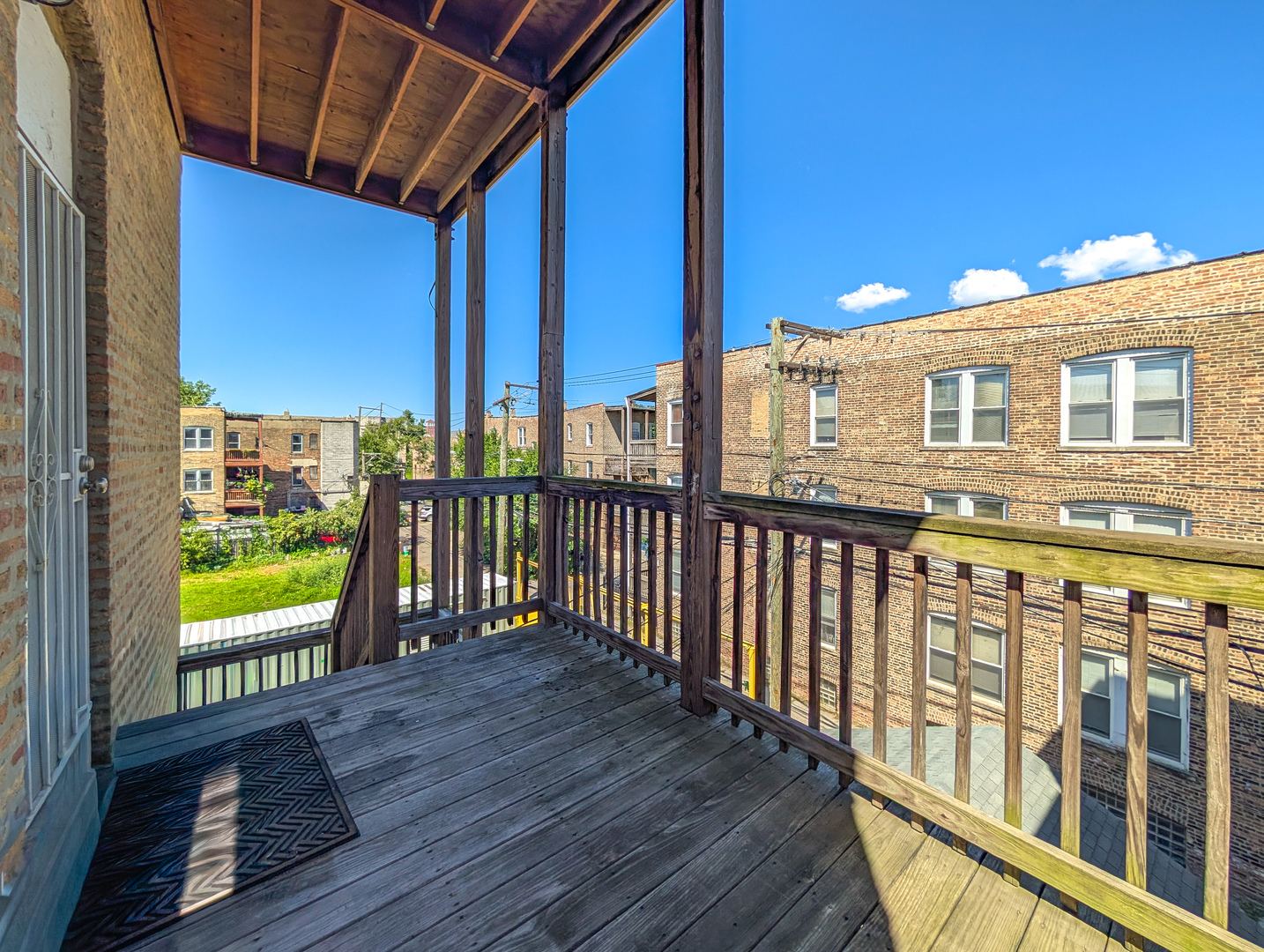 2838 West Roosevelt Road, Unit 3R Chicago, IL 60612 - Photo 20 of 23 a view of a building from a balcony