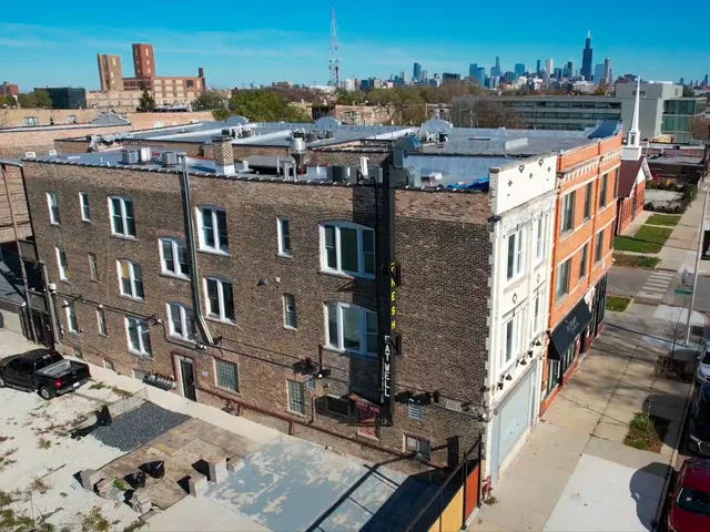a view of a buildings in the background