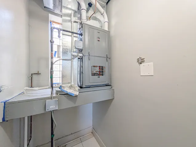 a view of kitchen with furniture and wooden floor