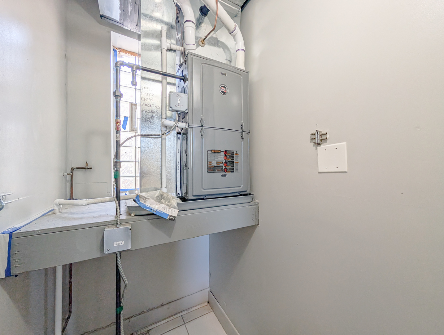 2838 West Roosevelt Road, Unit 3R Chicago, IL 60612 - Photo 9 of 23 a view of kitchen with furniture and wooden floor