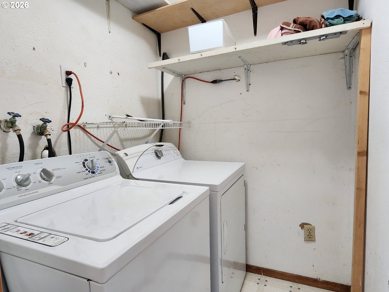 92504 Paradise Point Road Port Orford, OR 97465 - Photo 23 of 39 a utility room with dryer and washer