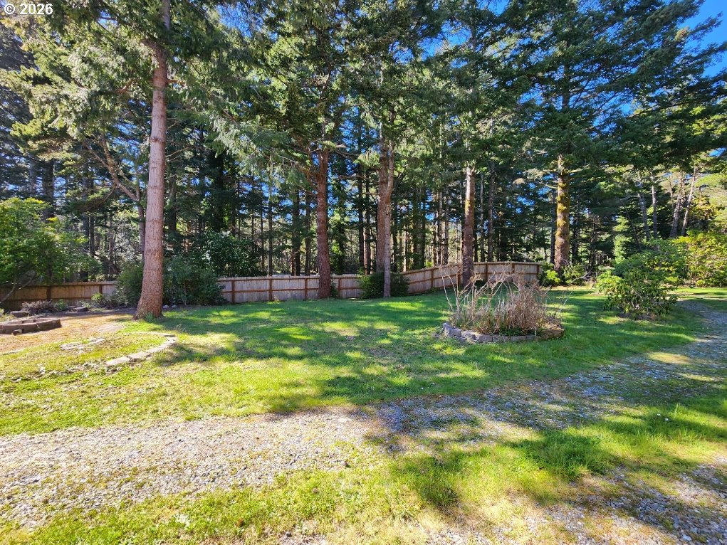 92504 Paradise Point Road Port Orford, OR 97465 - Photo 3 of 39 a view of a backyard with green space