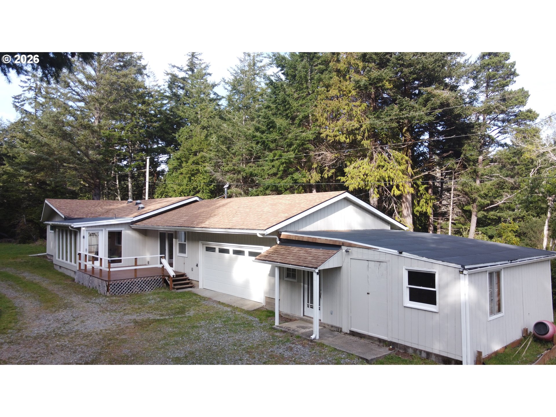 92504 Paradise Point Road Port Orford, OR 97465 - Photo 36 of 39 a house view with a garden space
