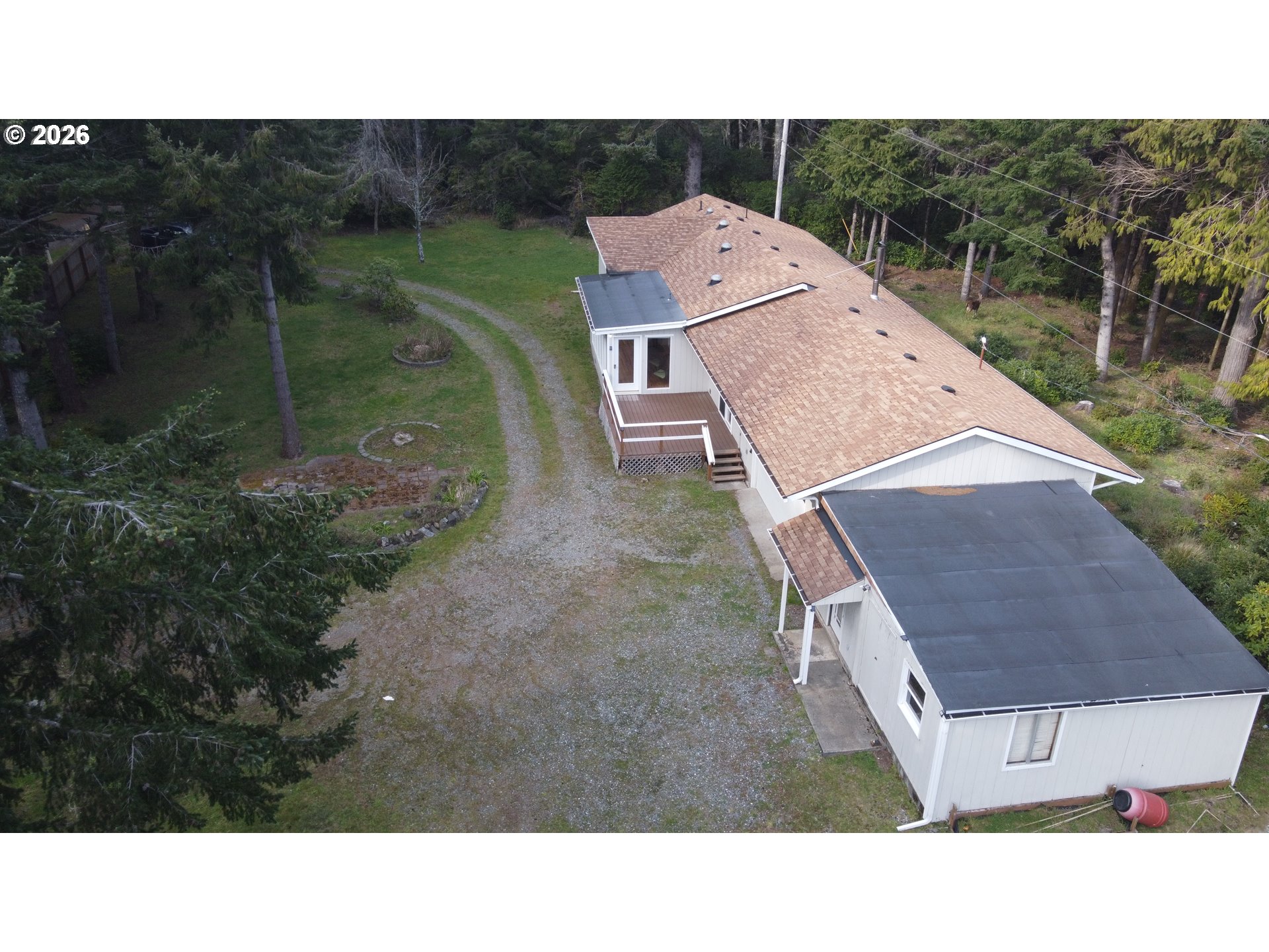 92504 Paradise Point Road Port Orford, OR 97465 - Photo 38 of 39 a aerial view of a house