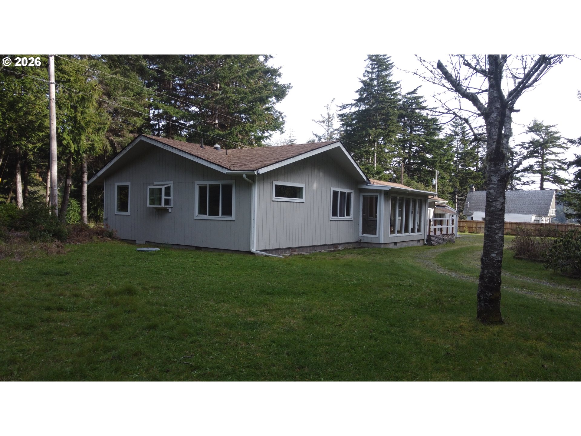 92504 Paradise Point Road Port Orford, OR 97465 - Photo 39 of 39 a black and white photo of a house