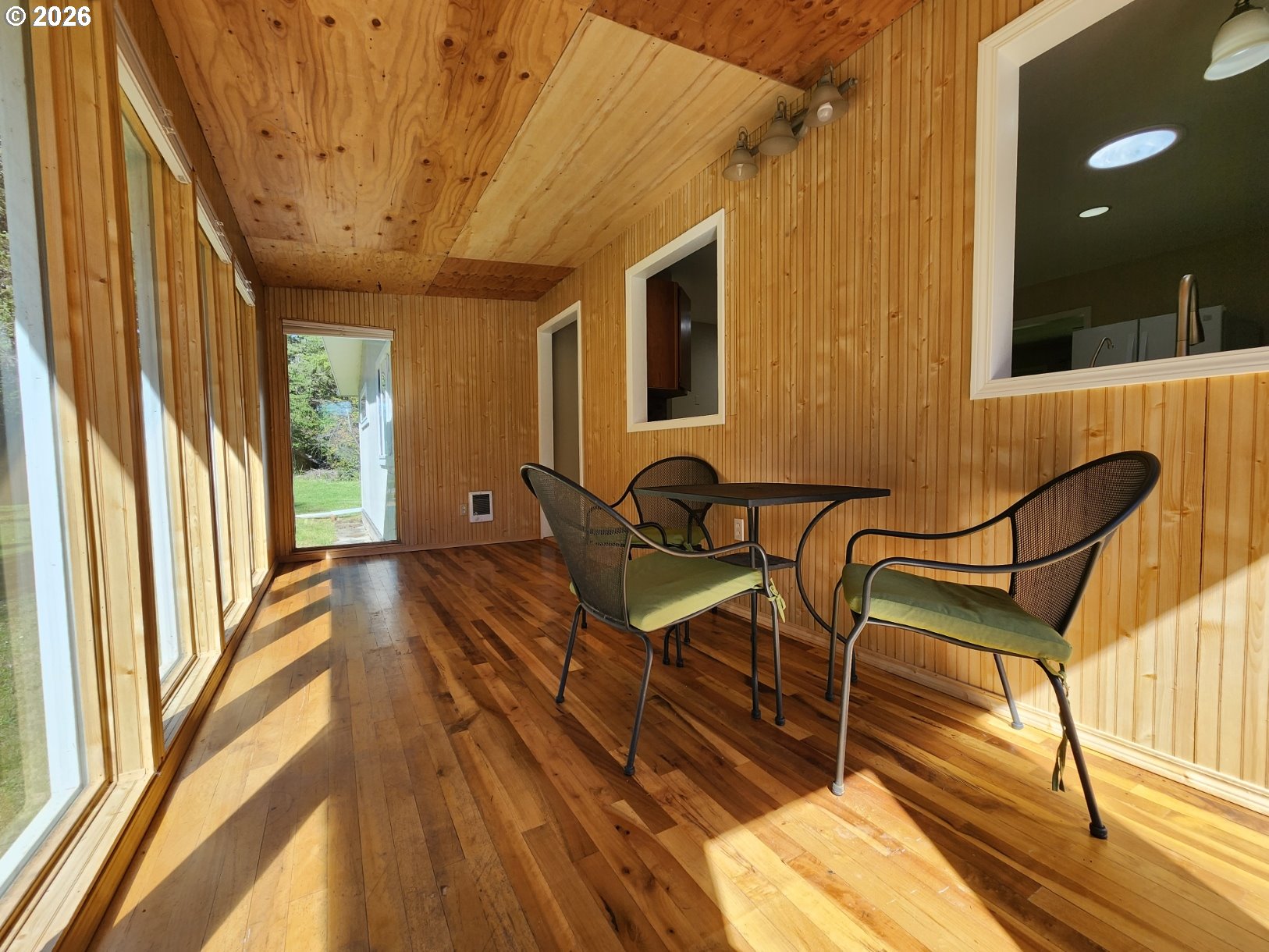 92504 Paradise Point Road Port Orford, OR 97465 - Photo 4 of 39 a view of a chairs and table in the balcony