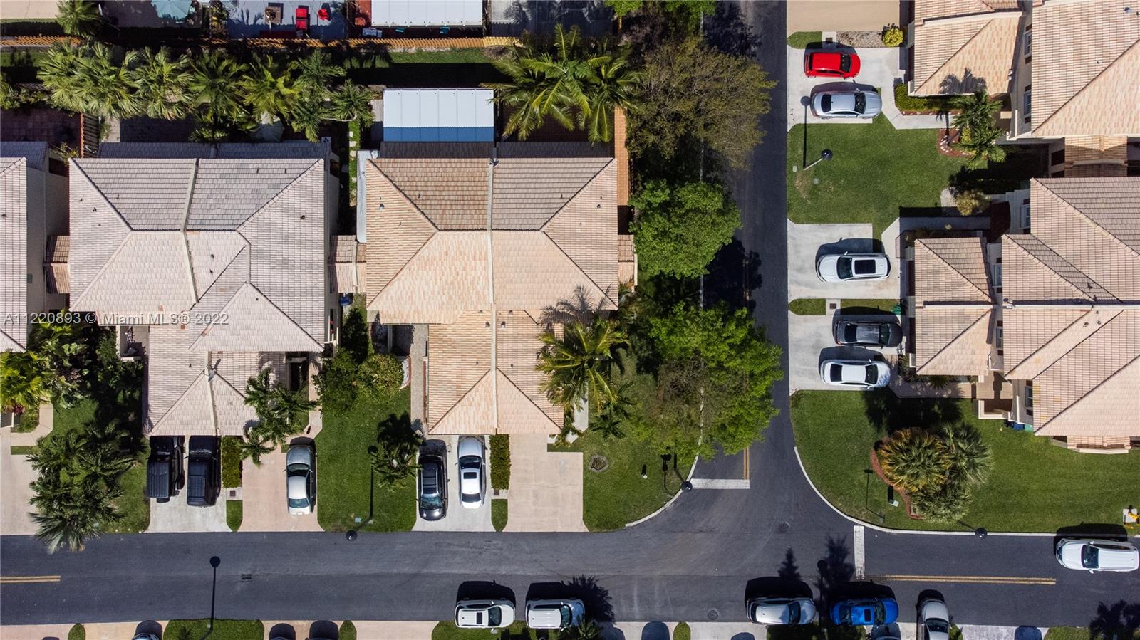 West Kendall Miami, FL 33193 - Photo 24 of 33 an aerial view of a house with garden space and street view