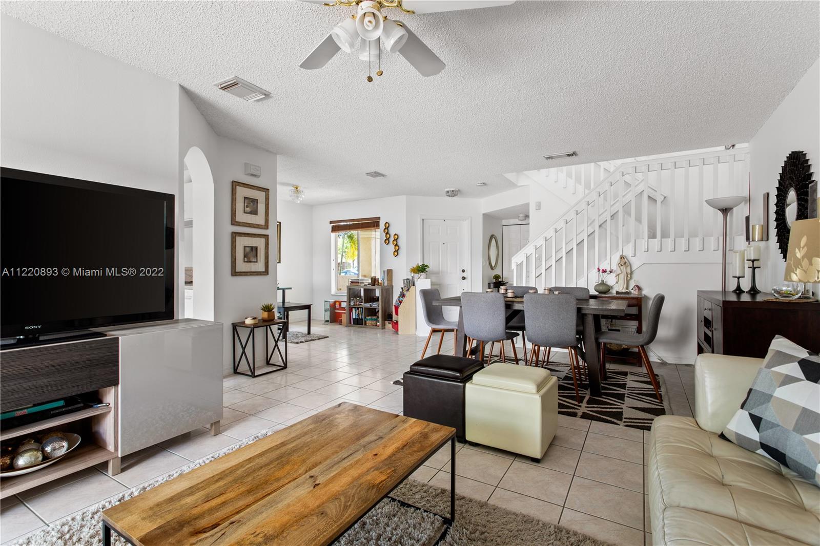 West Kendall Miami, FL 33193 - Photo 8 of 33 a living room with furniture and a flat screen tv