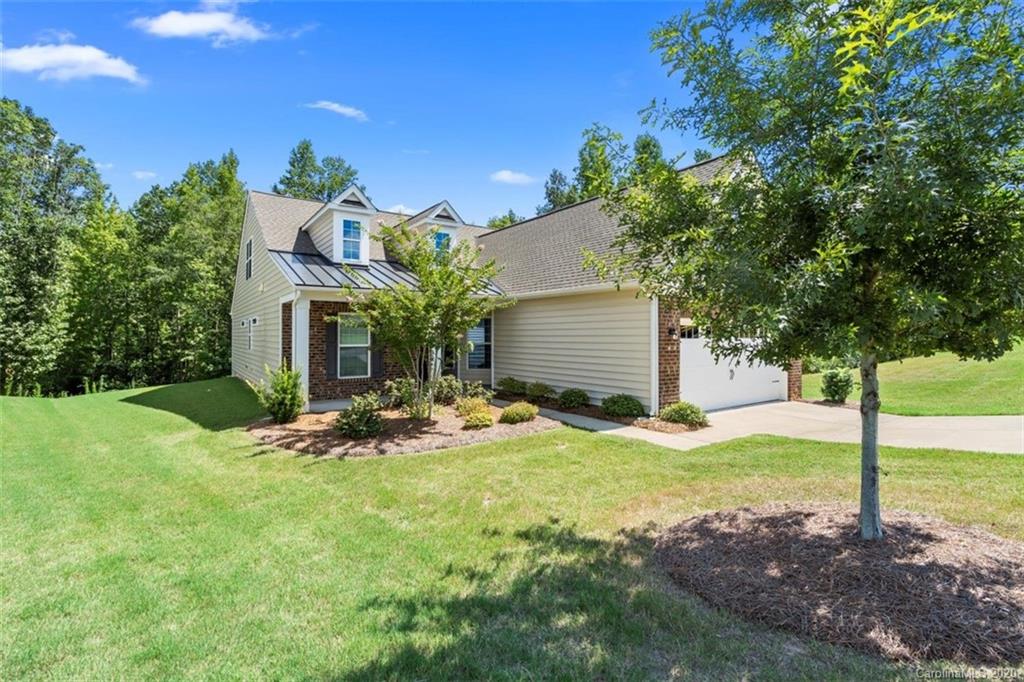 4303 Perth Road Indian Land, SC 29707 - Photo 2 of 32 a view of a house with backyard and sitting area