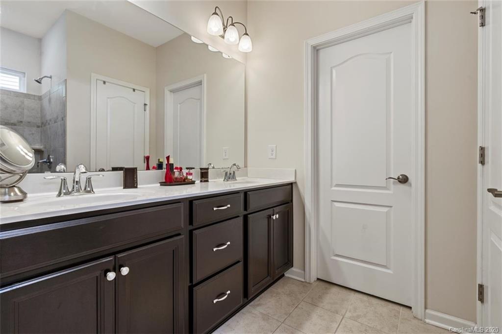 4303 Perth Road Indian Land, SC 29707 - Photo 25 of 32 a bathroom with double sink and a mirror