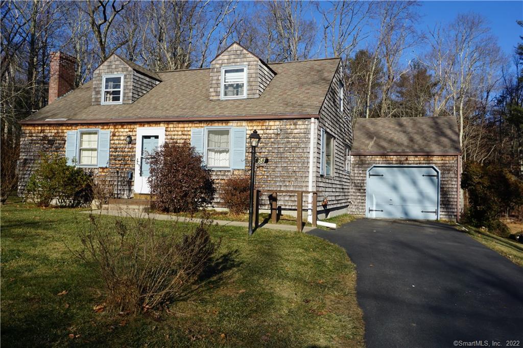 a view of a back yard of the house