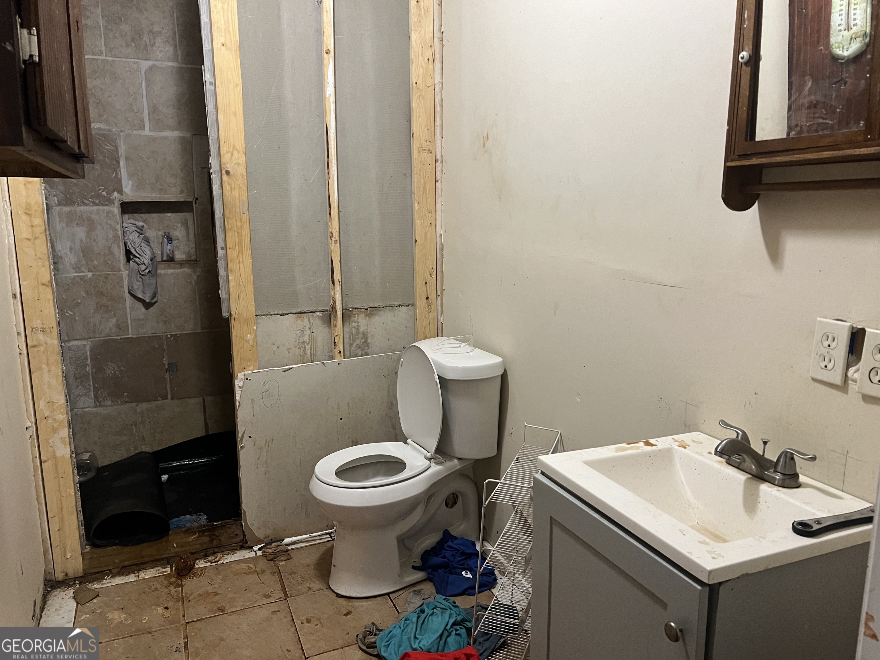 318 North Street Thomaston, GA 30286 - Photo 6 of 9 a bathroom with a sink and a toilet