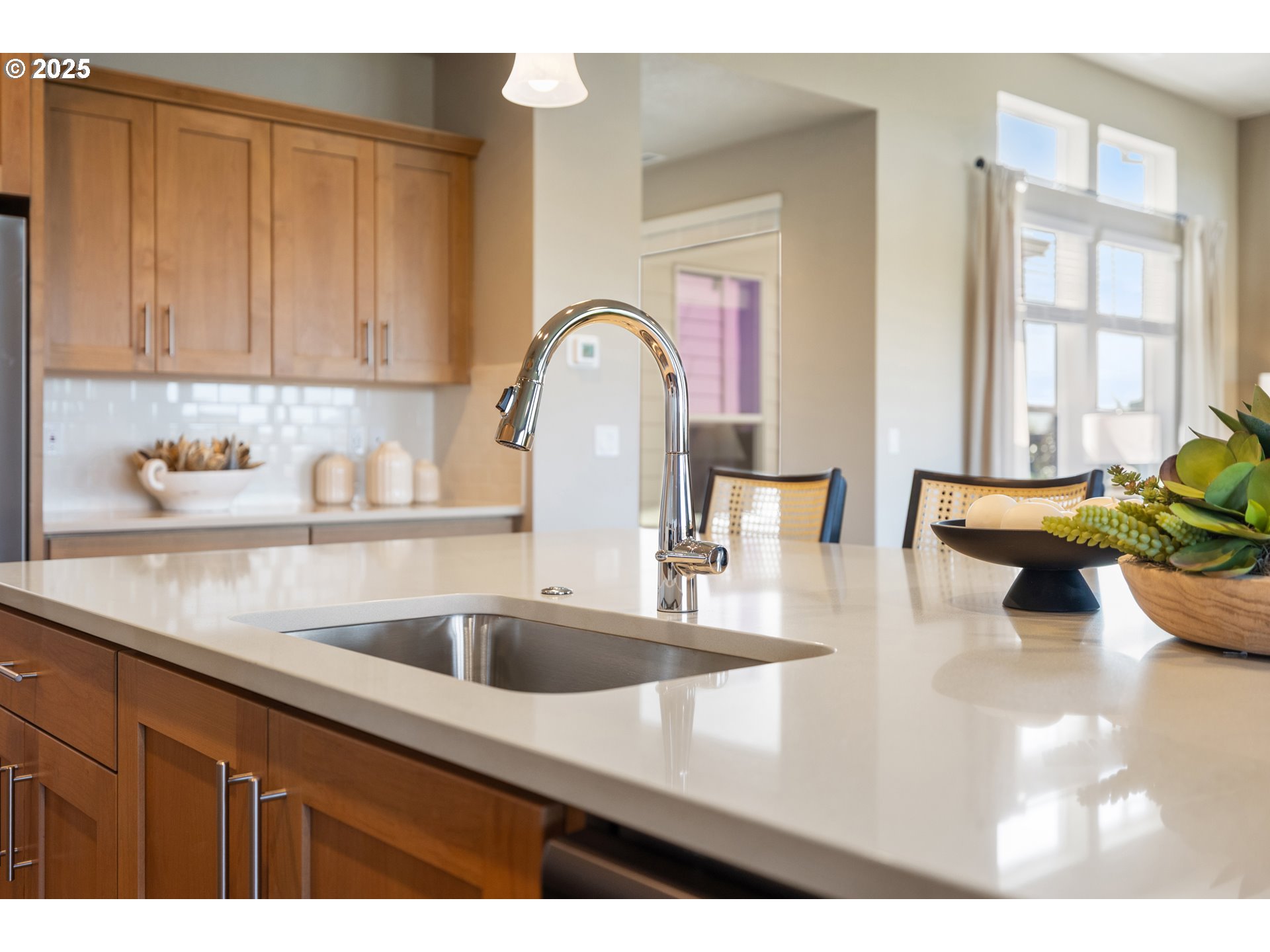 5567 North 94th Avenue, Unit LT247 Camas, WA 98607 - Photo 12 of 35 a kitchen with kitchen island a sink a stove and cabinets