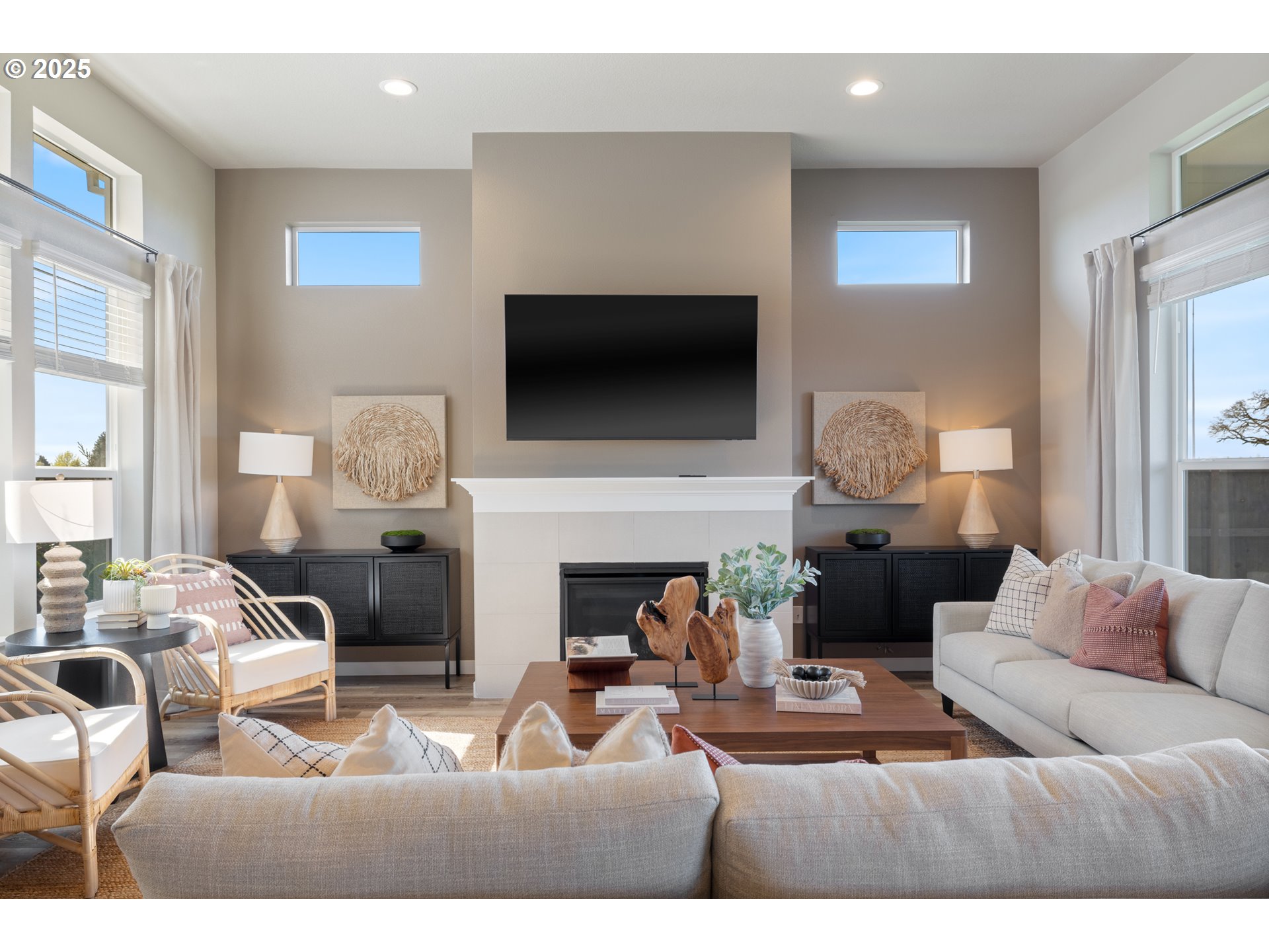 5567 North 94th Avenue, Unit LT247 Camas, WA 98607 - Photo 14 of 35 a living room with furniture a fireplace and a flat screen tv