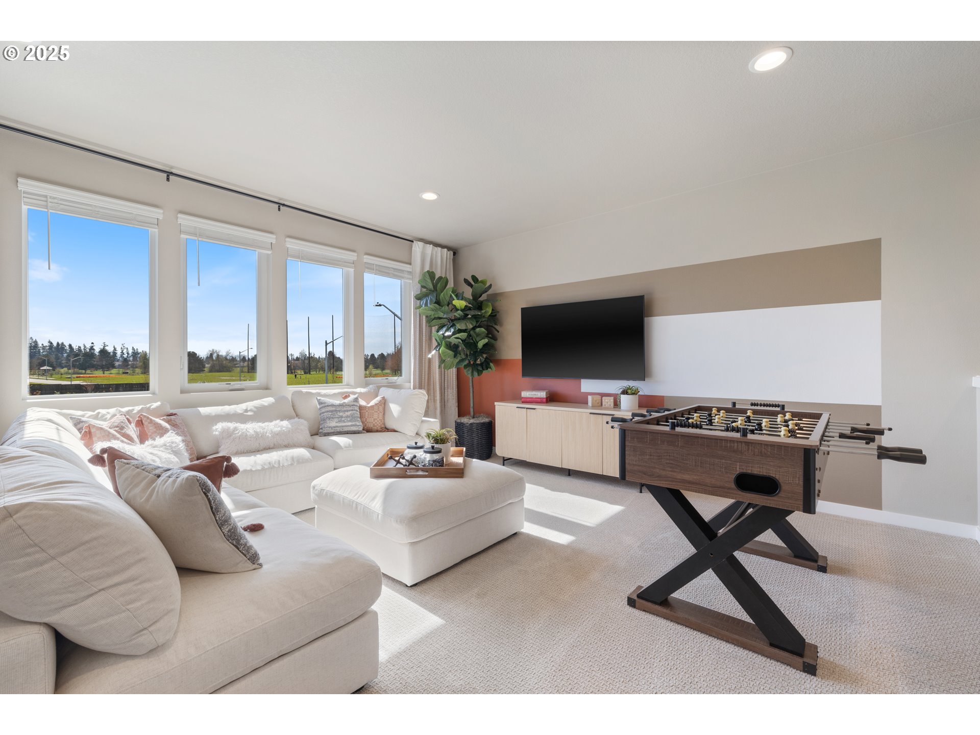 5567 North 94th Avenue, Unit LT247 Camas, WA 98607 - Photo 21 of 35 a living room with furniture and a flat screen tv