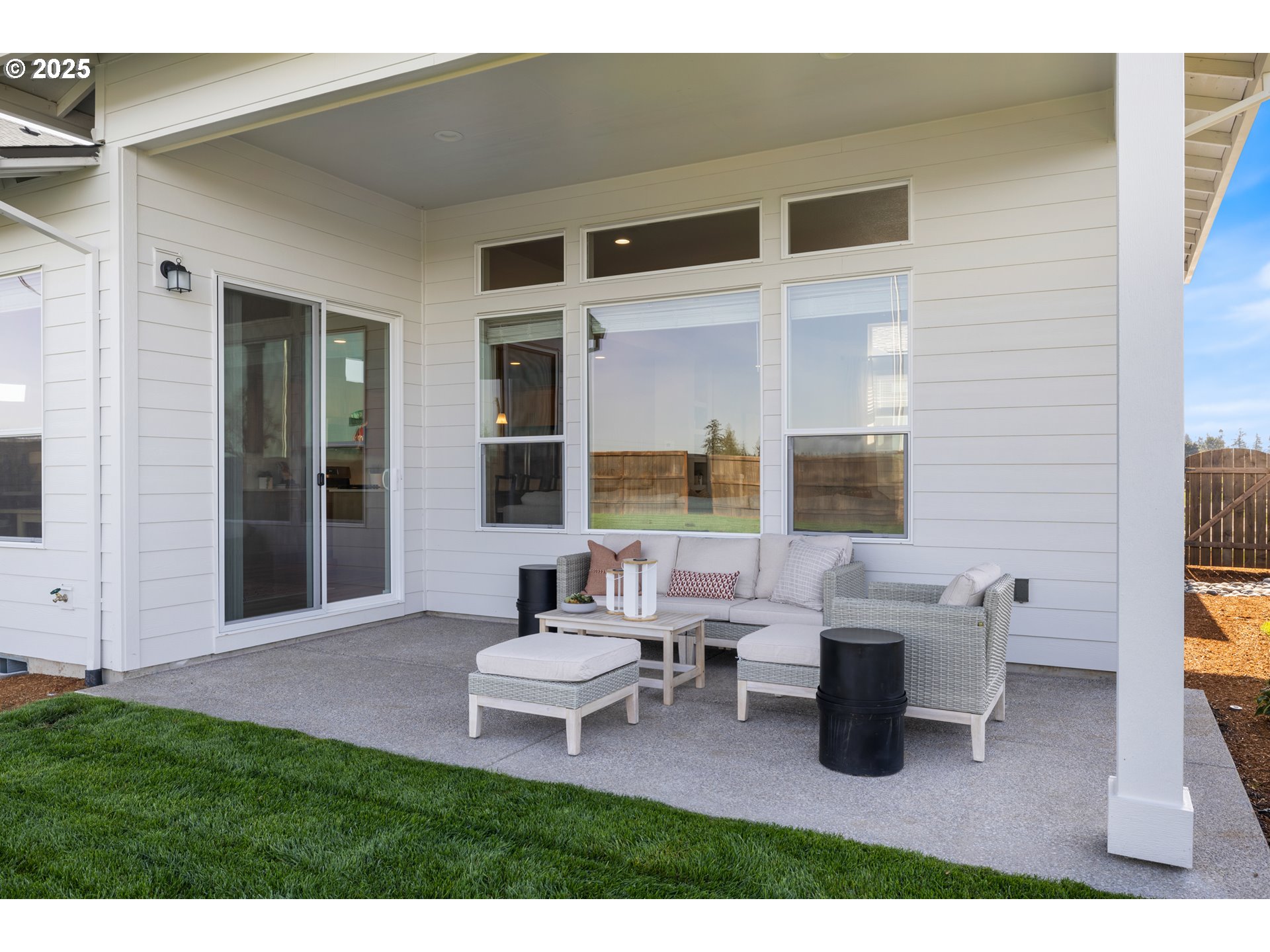 5567 North 94th Avenue, Unit LT247 Camas, WA 98607 - Photo 32 of 35 a building outdoor space with patio furniture and potted plants
