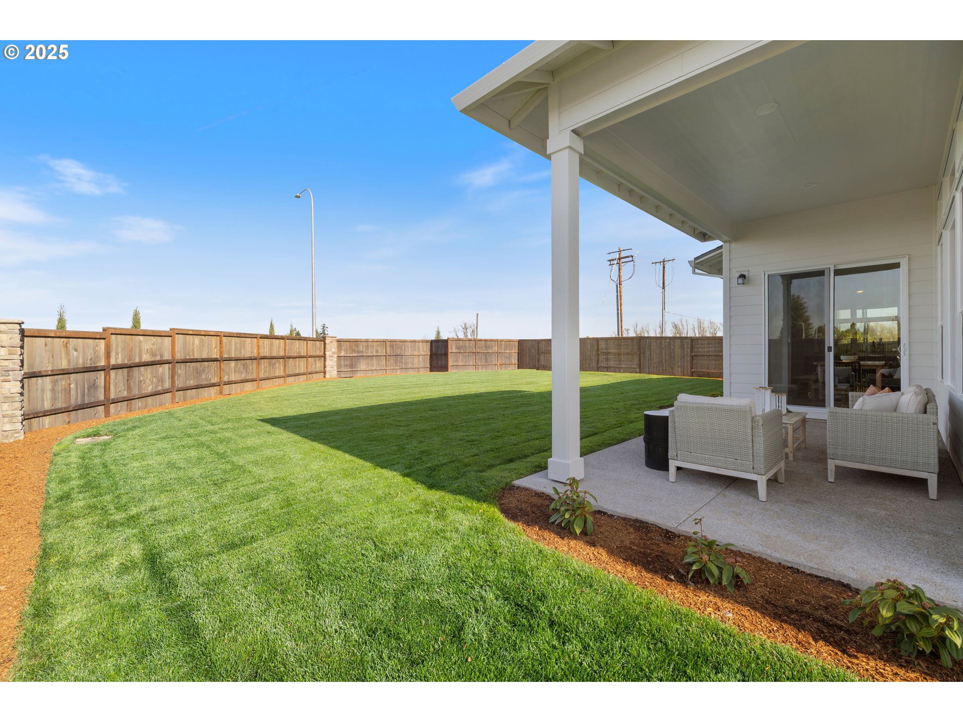 5567 North 94th Avenue, Unit LT247 Camas, WA 98607 - Photo 33 of 35 a view of a backyard with sitting area