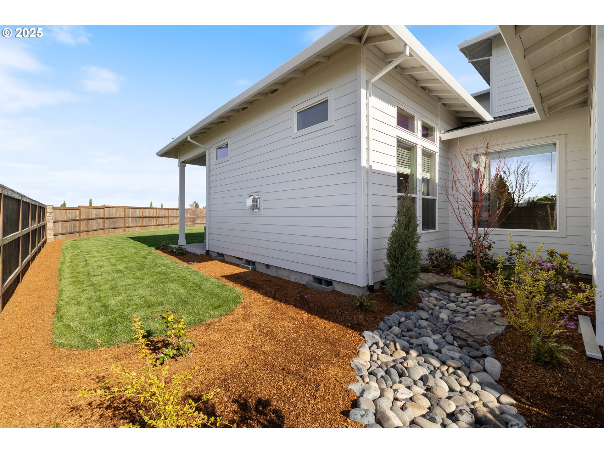 5567 North 94th Avenue, Unit LT247 Camas, WA 98607 - Photo 35 of 35 a view of a house with a backyard