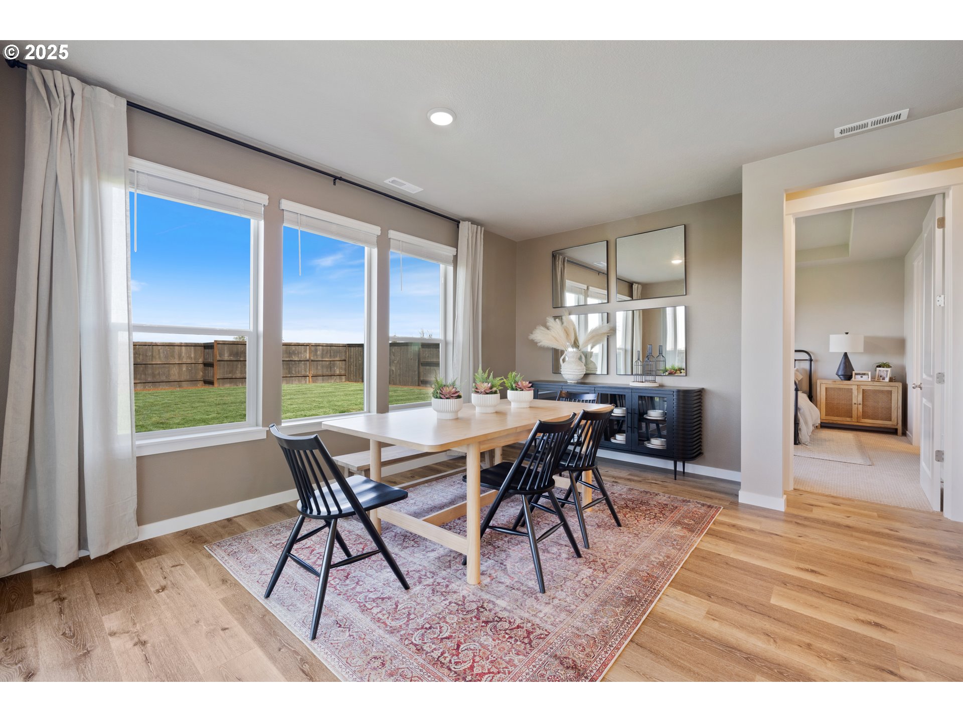 5567 North 94th Avenue, Unit LT247 Camas, WA 98607 - Photo 7 of 35 a view of a dining room with furniture window and wooden floor