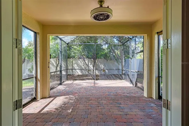 a view of empty room with windows