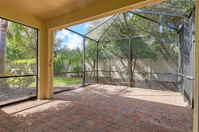 a view of backyard with tree