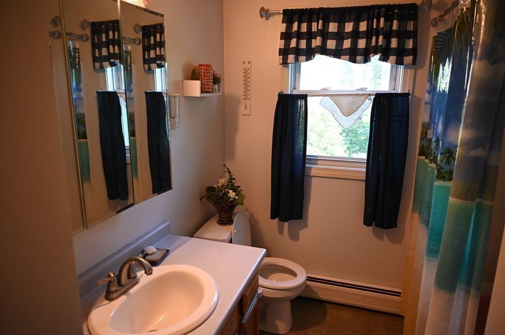 6 Shawnee Road Worcester, MA 01606 - Photo 12 of 39 a bathroom with a sink toilet and shower