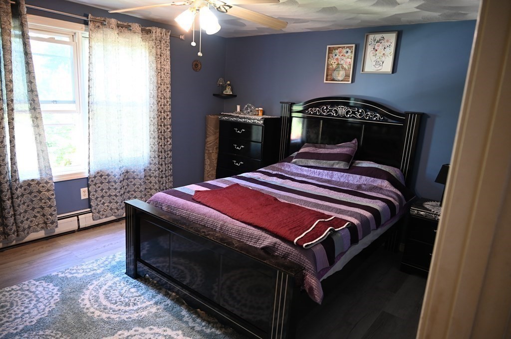 6 Shawnee Road Worcester, MA 01606 - Photo 13 of 39 a bedroom with a bed and a window