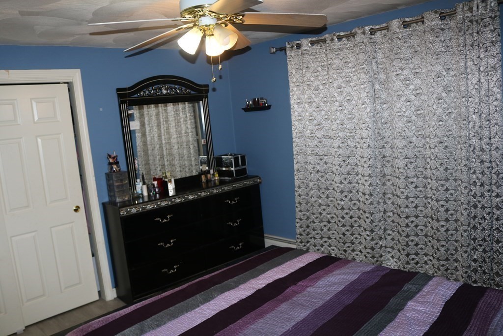 6 Shawnee Road Worcester, MA 01606 - Photo 16 of 39 a bathroom with a sink a mirror and a shower