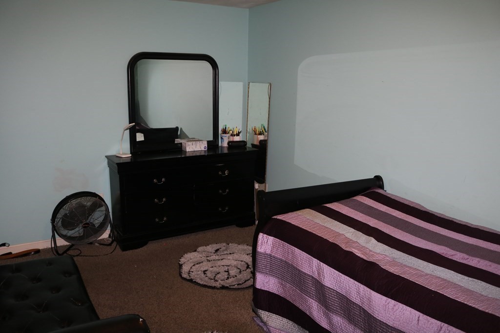 6 Shawnee Road Worcester, MA 01606 - Photo 20 of 39 a bedroom with a bed and a dresser