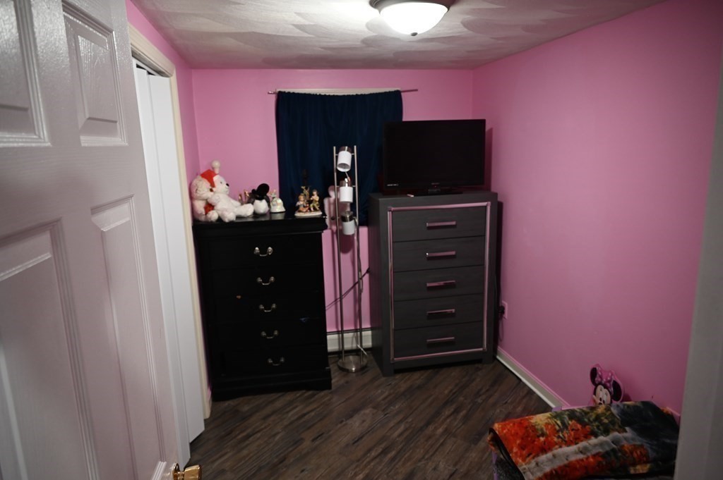 6 Shawnee Road Worcester, MA 01606 - Photo 28 of 39 a living room with furniture and a flat screen tv
