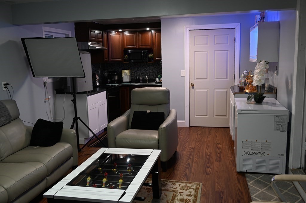 6 Shawnee Road Worcester, MA 01606 - Photo 31 of 39 a living room with furniture and a lamp