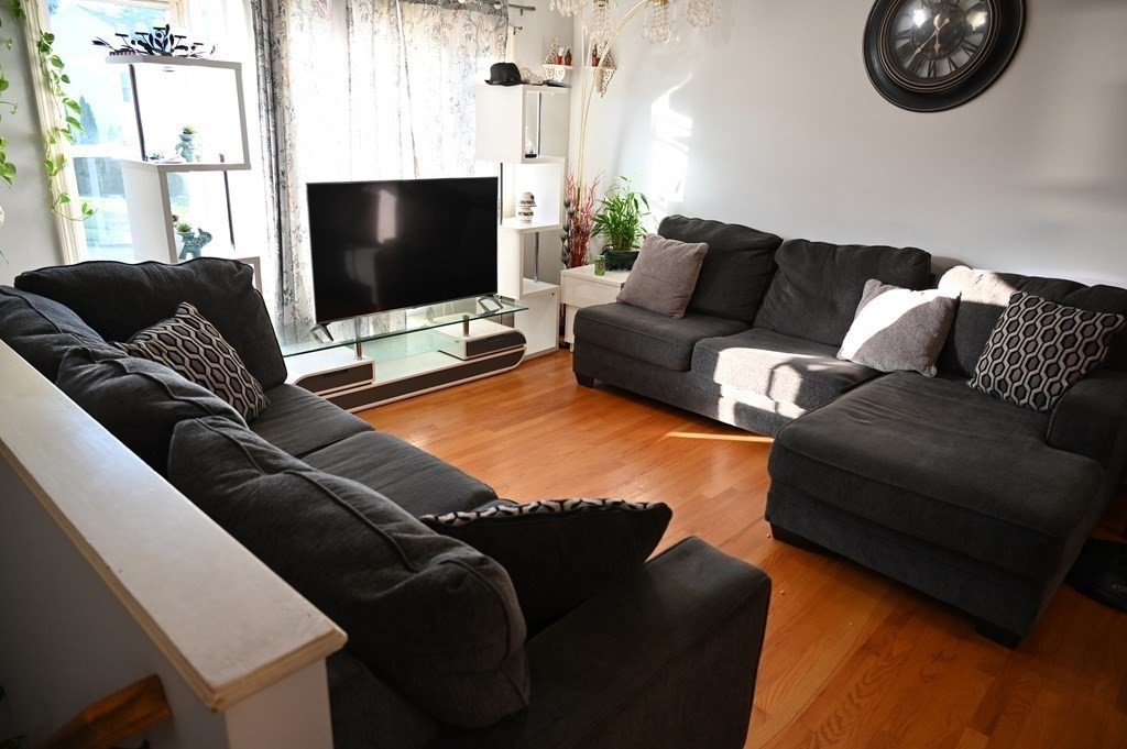 6 Shawnee Road Worcester, MA 01606 - Photo 4 of 39 a living room with furniture and a flat screen tv
