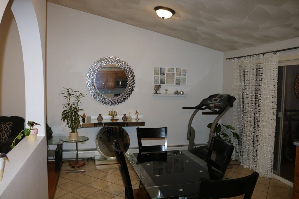 6 Shawnee Road Worcester, MA 01606 - Photo 7 of 39 a living room with furniture and a mirror