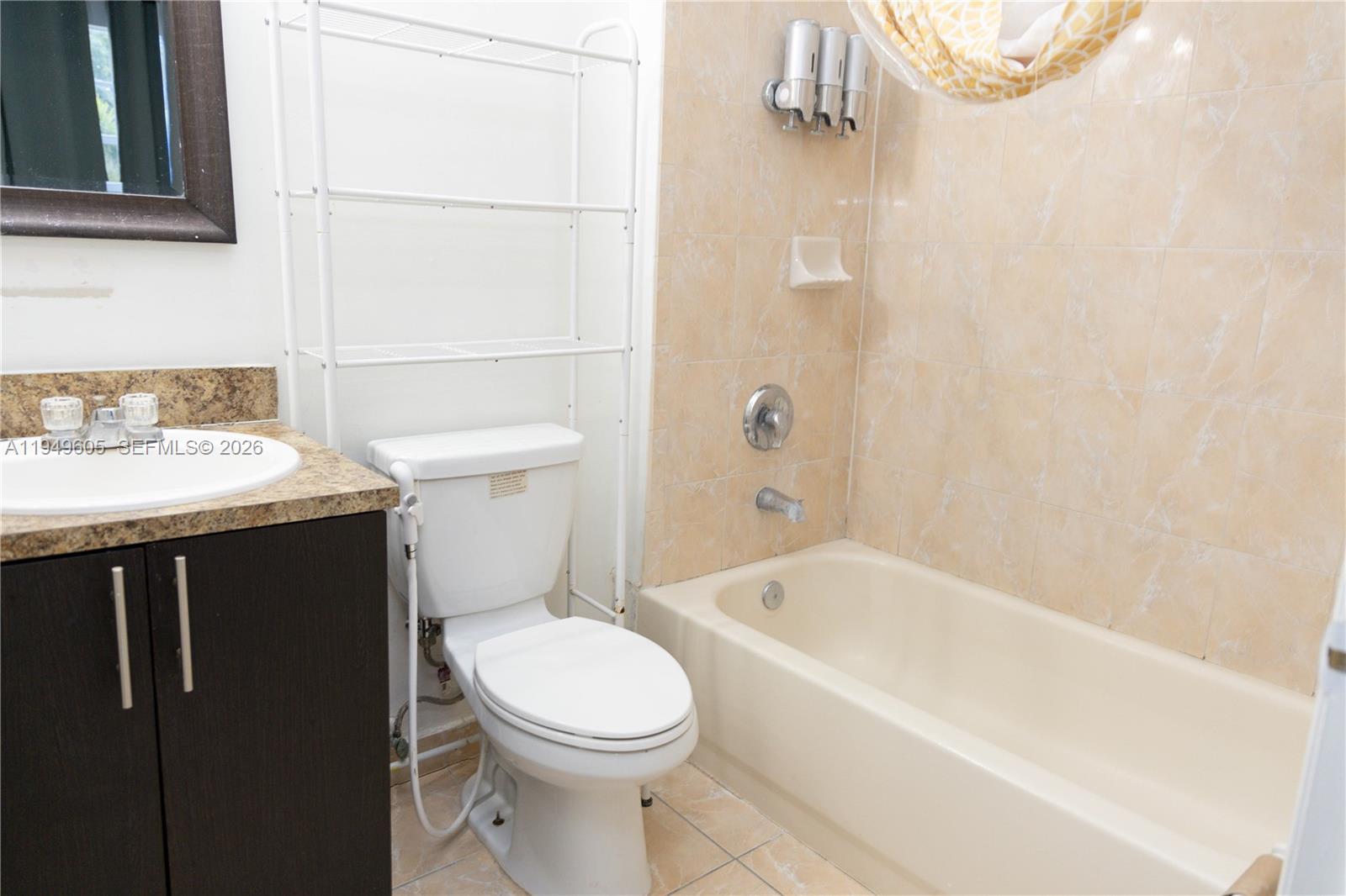 761 Southeast 2nd Street Homestead, FL 33030 - Photo 13 of 17 a bathroom with a sink a toilet and shower