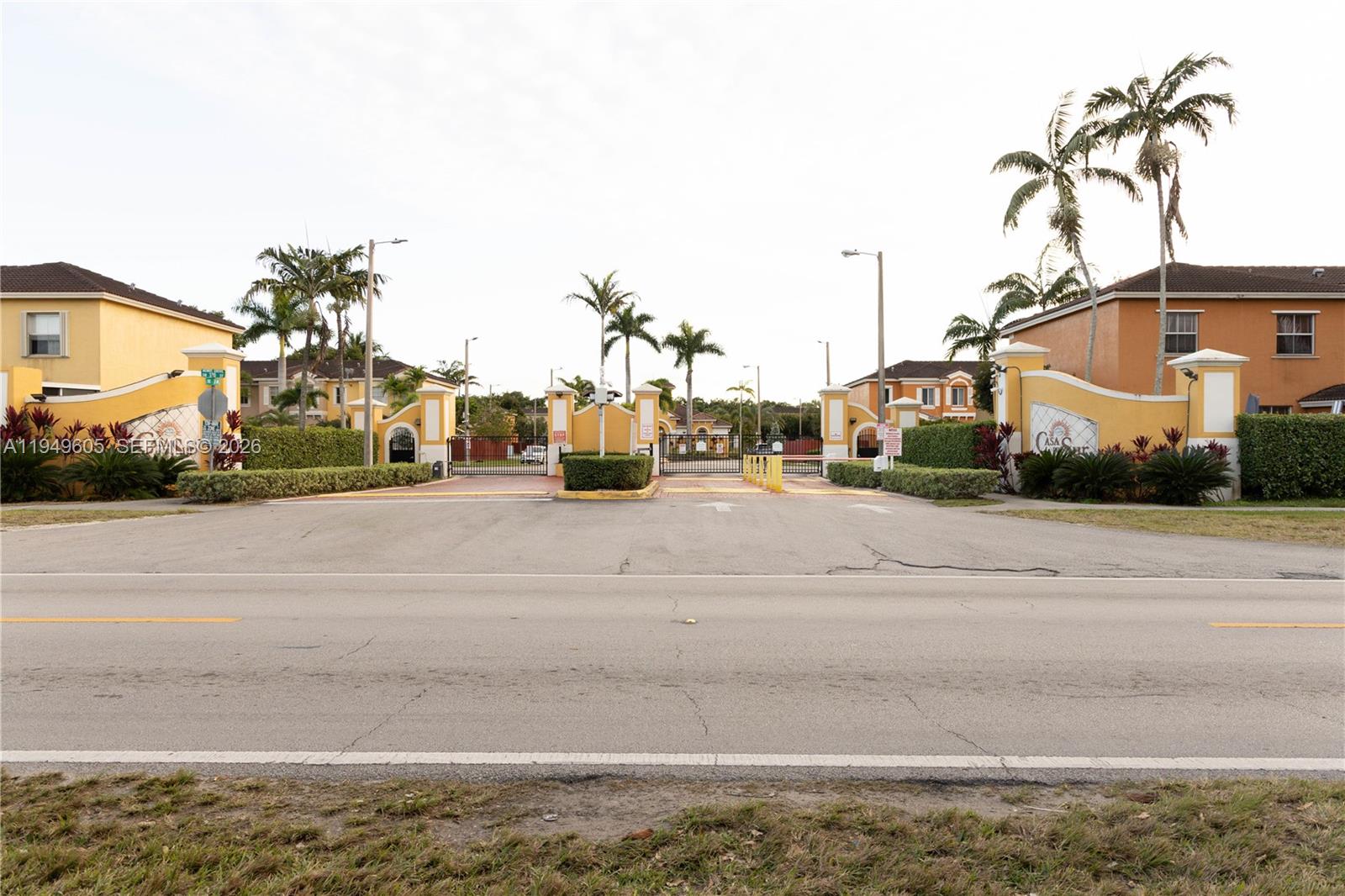 761 Southeast 2nd Street Homestead, FL 33030 - Photo 14 of 17 a street with a road and a building in the background