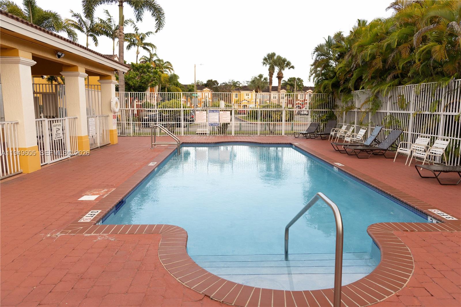 761 Southeast 2nd Street Homestead, FL 33030 - Photo 16 of 17 swimming pool view with a outdoor seating