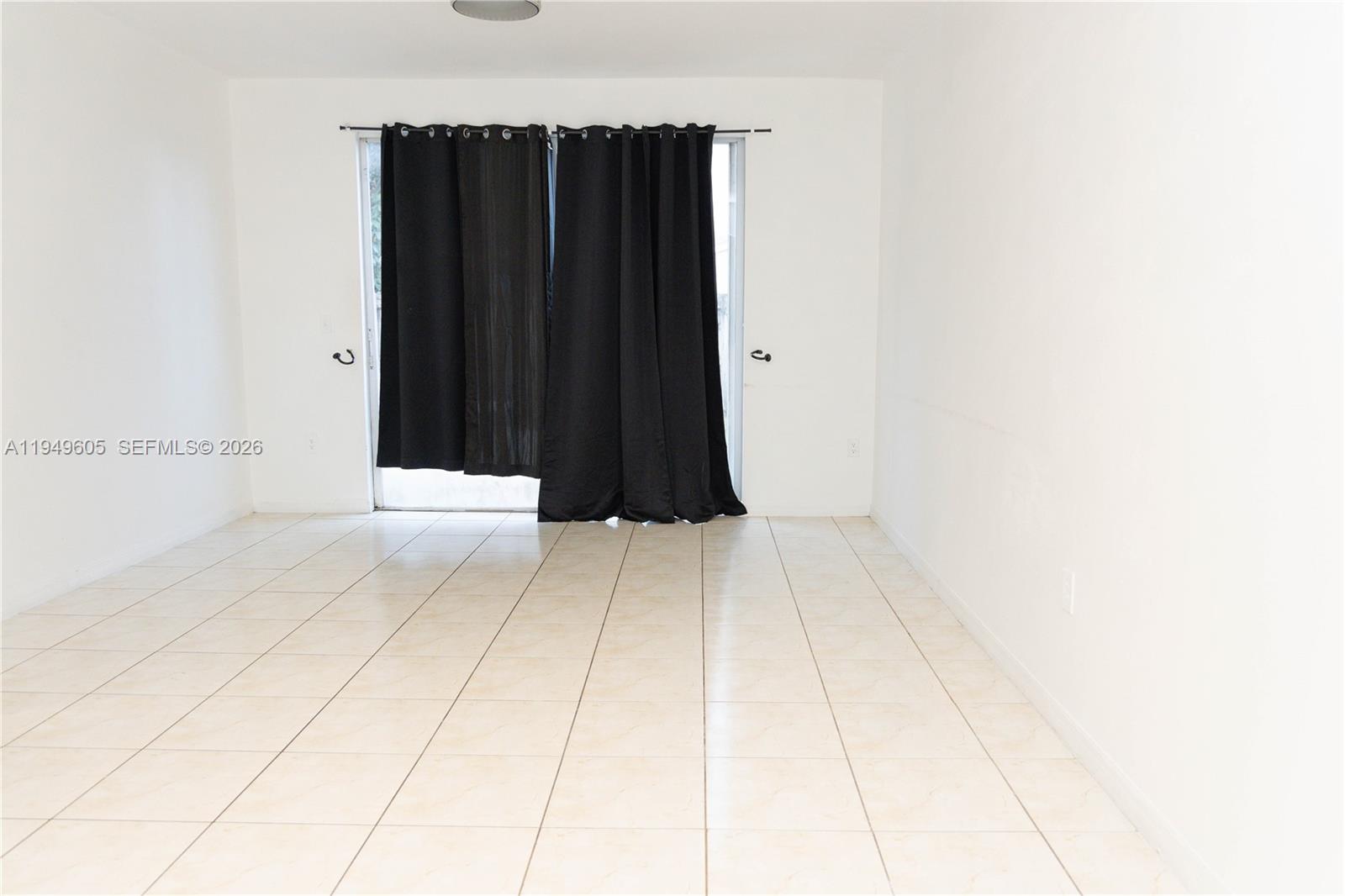 761 Southeast 2nd Street Homestead, FL 33030 - Photo 4 of 17 a view of wooden floor