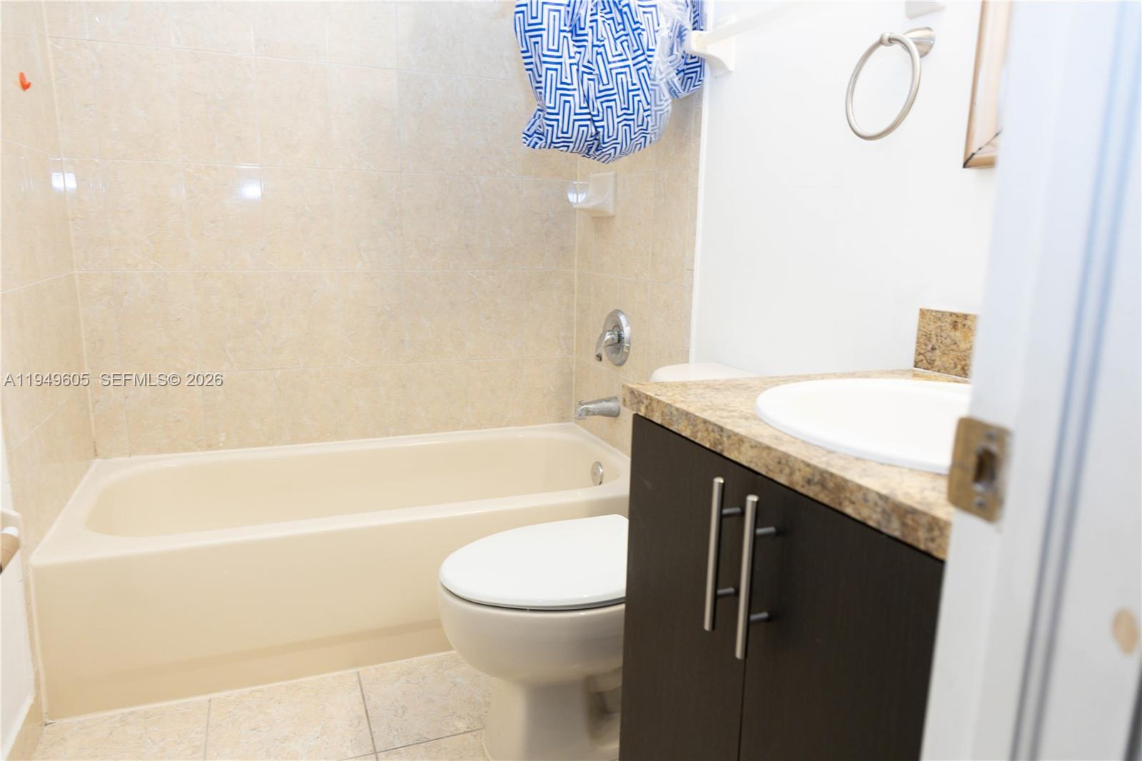 761 Southeast 2nd Street Homestead, FL 33030 - Photo 9 of 17 a bathroom with a sink a toilet and shower