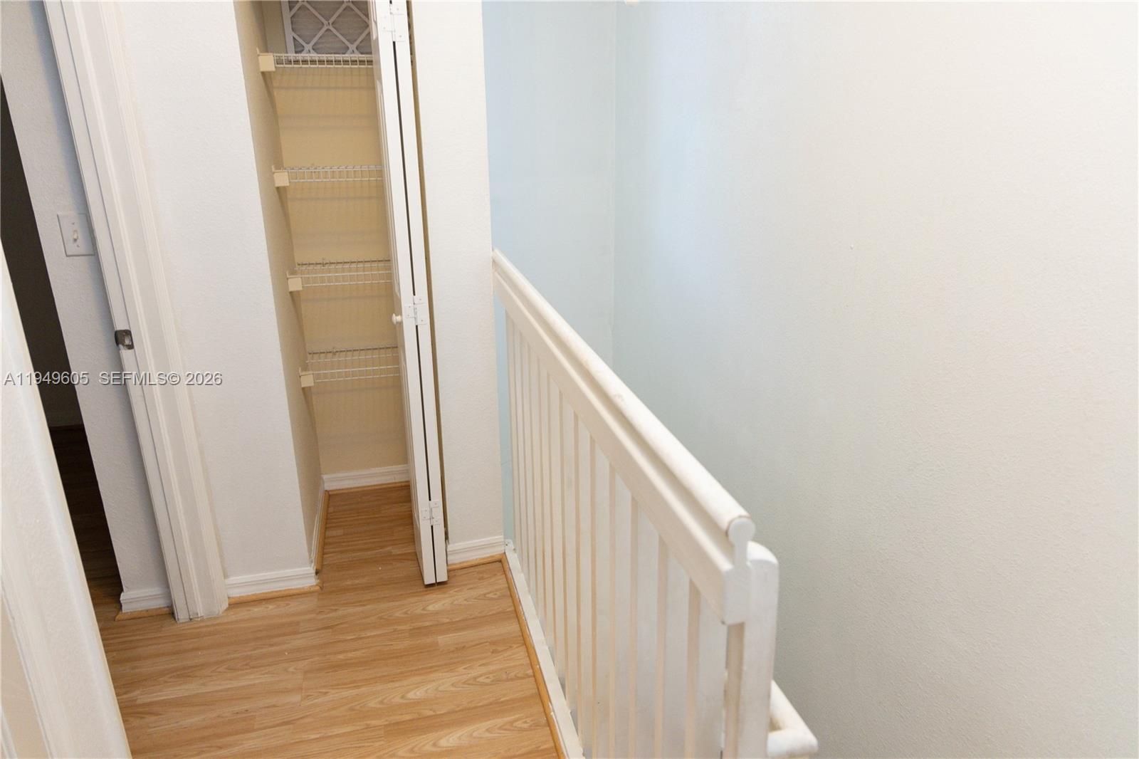 761 Southeast 2nd Street Homestead, FL 33030 - Photo 10 of 17 a view of a hallway with wooden floor and entryway
